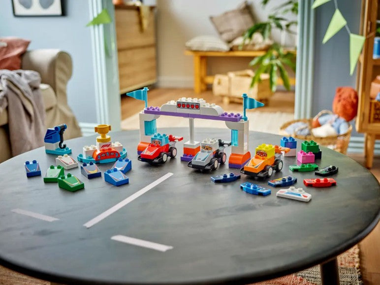 Coches de Carreras y Pilotos del Equipo de F1®