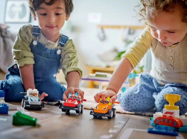 Coches de Carreras y Pilotos del Equipo de F1®